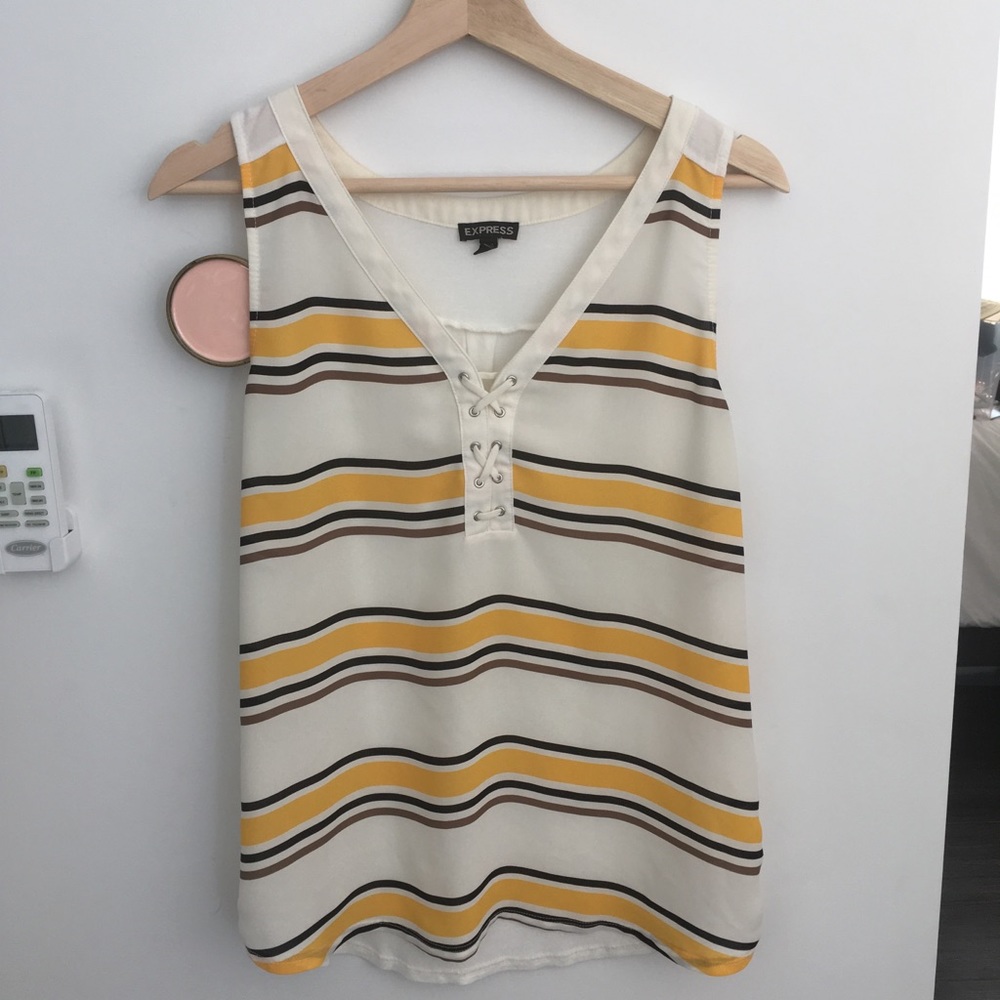 Black and yellow sleeveless blouse